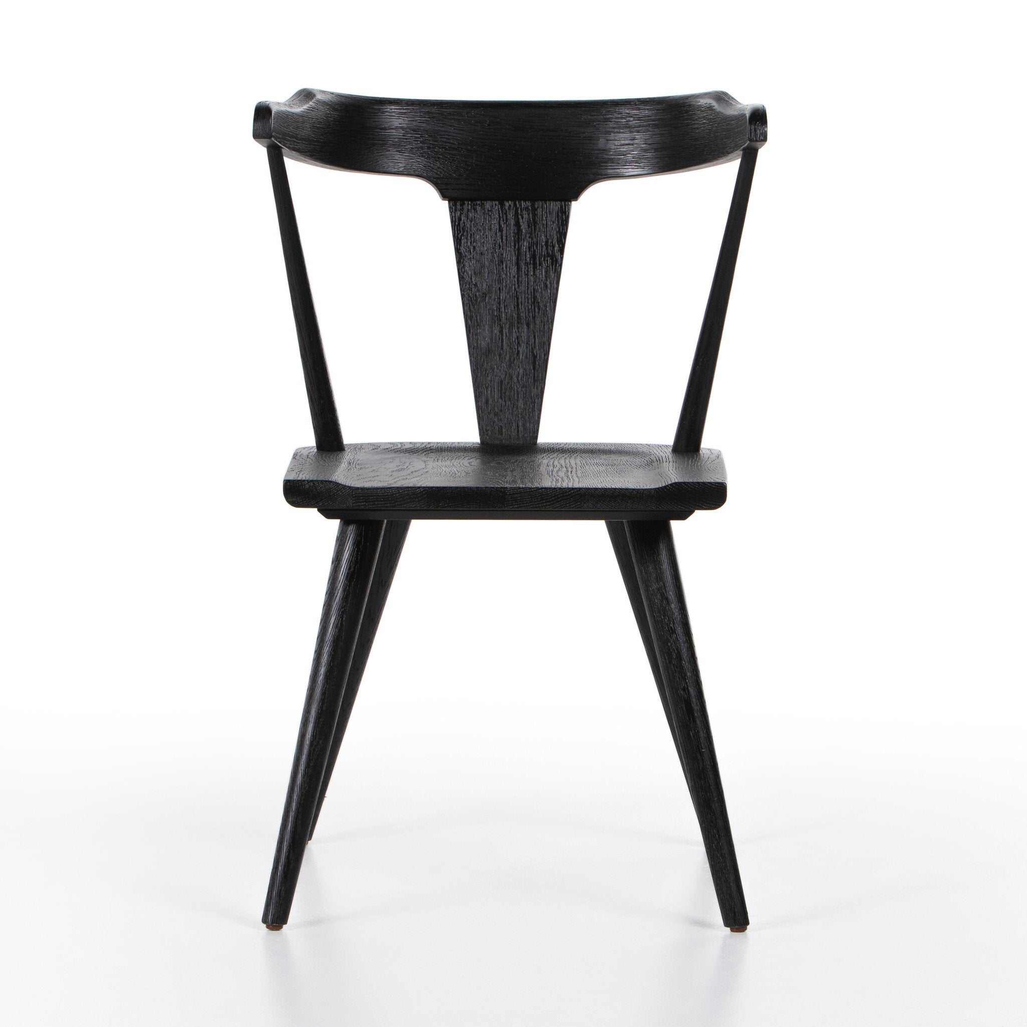 Black wooden dining chair on a white background. | Wildwood Home Co.