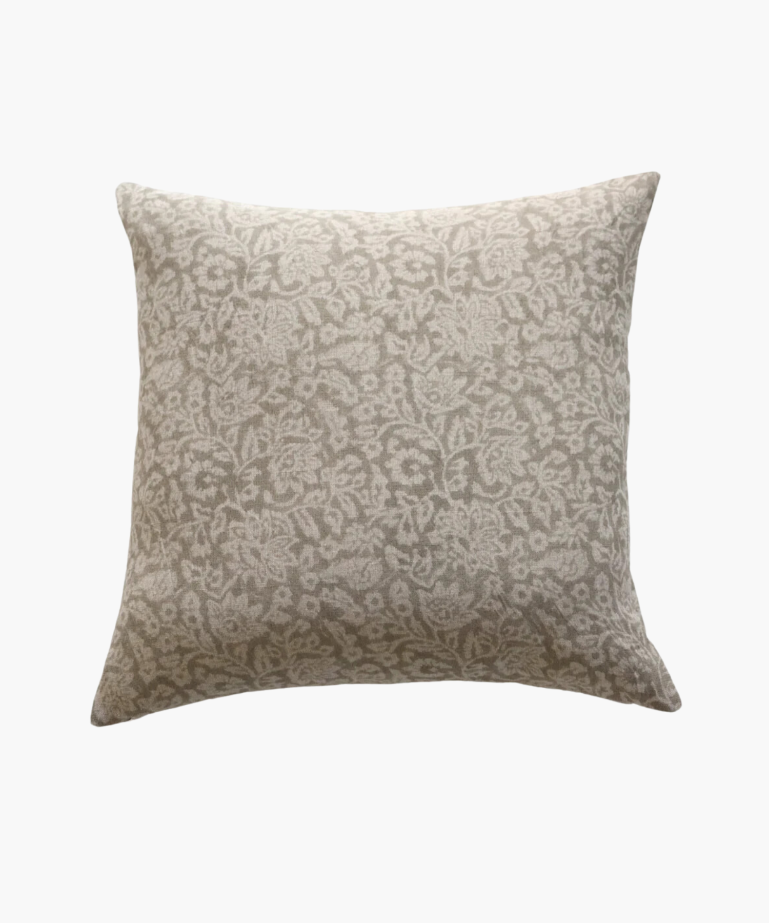 A beige square pillow with a light gray, intricate floral pattern. The design is elegant, adding a soft, decorative touch suitable for a cozy setting. | Wildwood Home Co.
