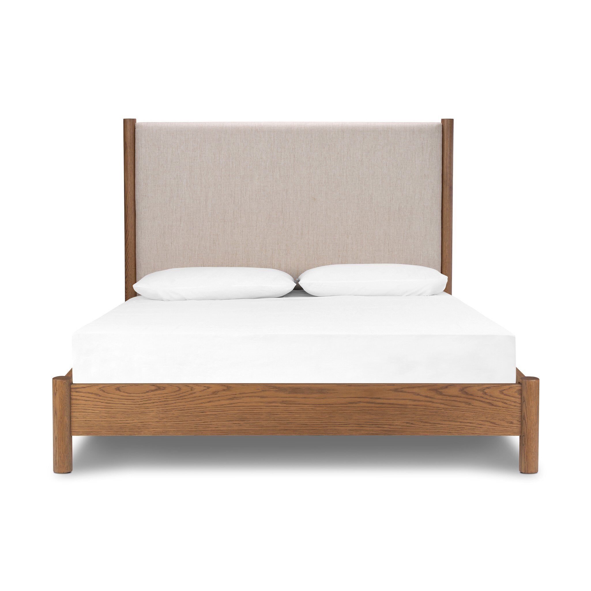 Wooden bed with upholstered headboard and white bedding on a white background
