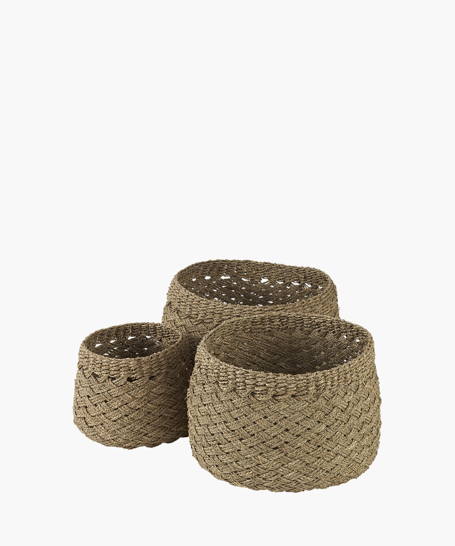 Three woven baskets in various sizes with a natural, textured appearance. The intricate zigzag pattern in earthy tones suggests rustic charm and simple elegance. | Wildwood Home Co.