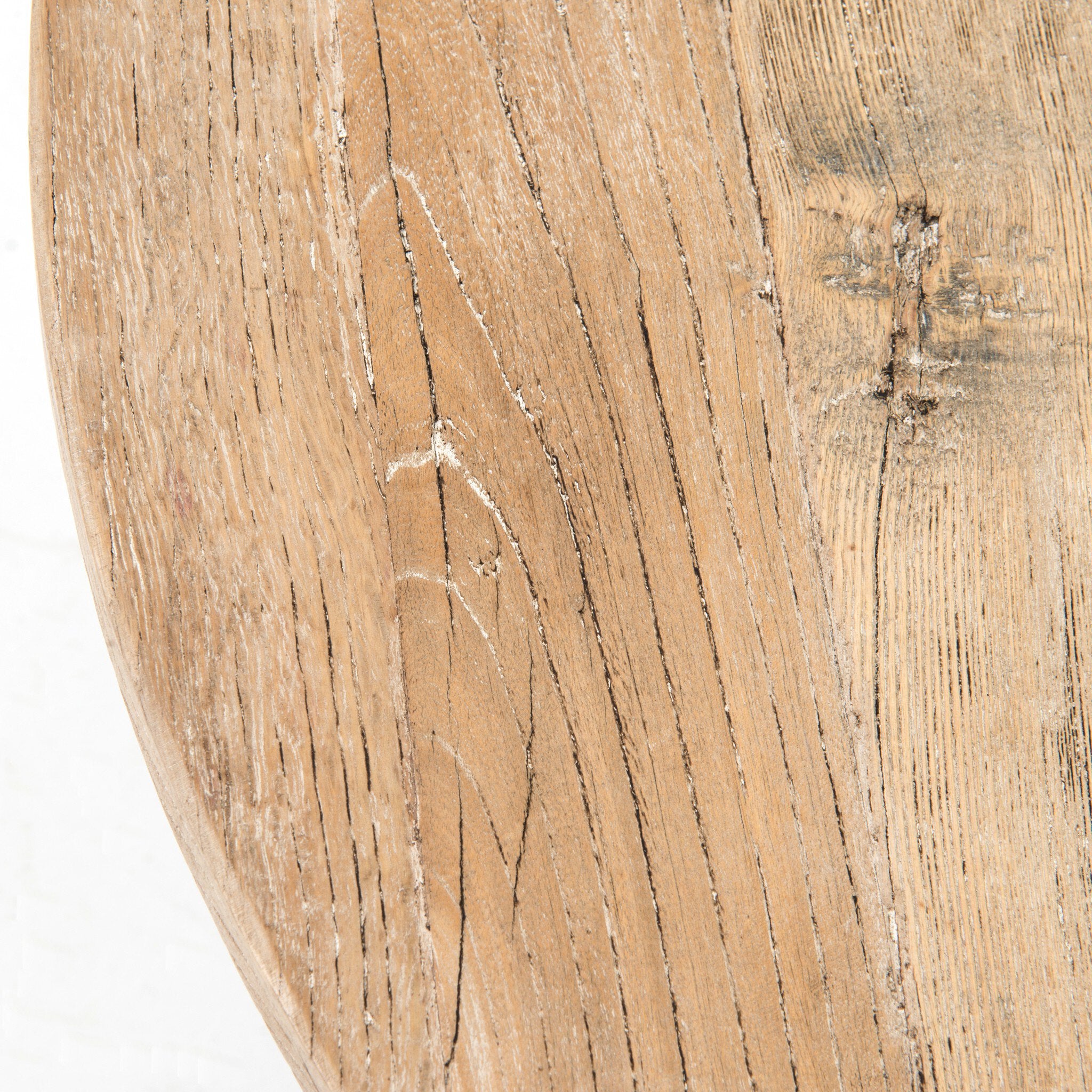 Close-up of the whitewashed table top showing its natural grain and texture.