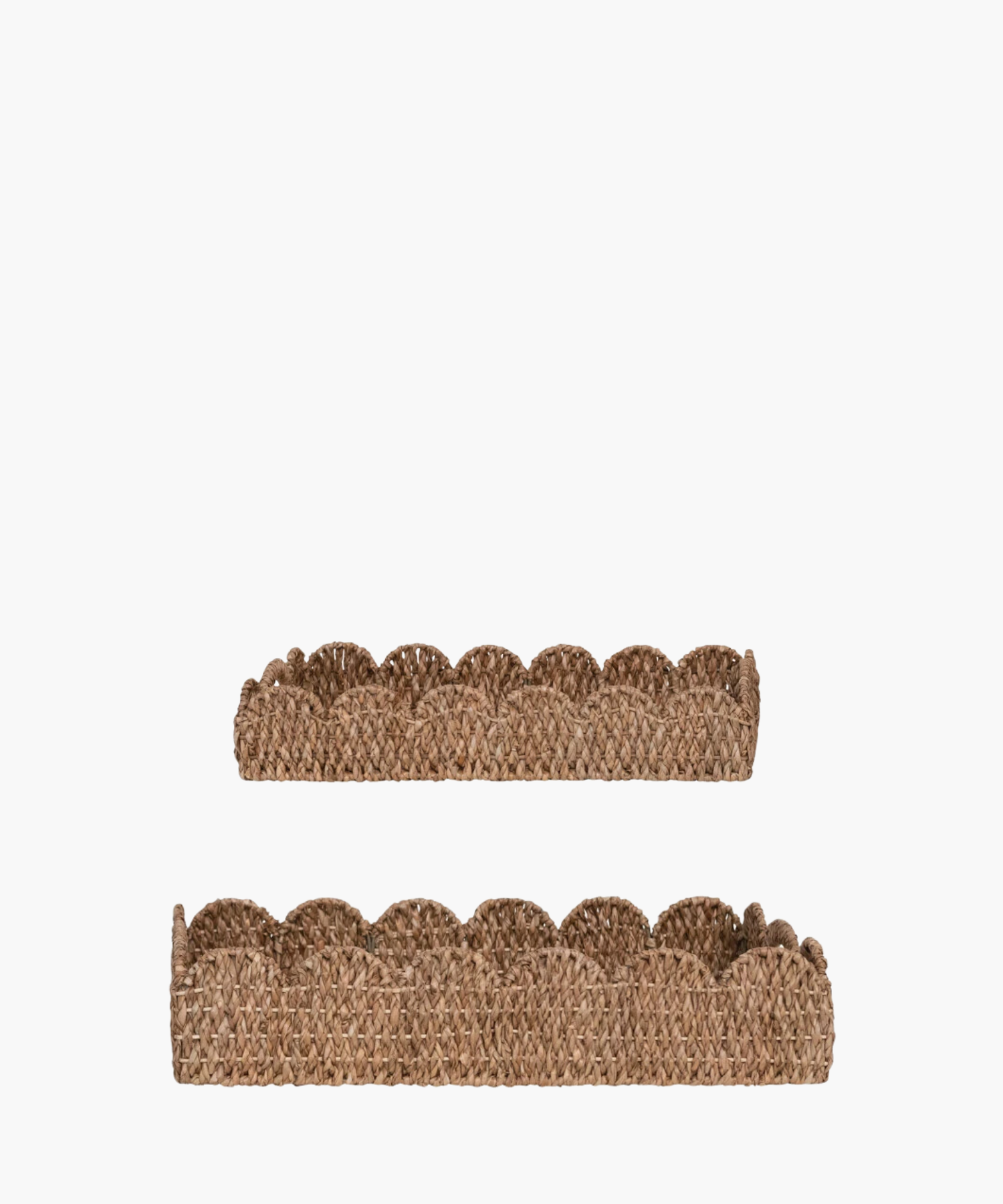 Two rectangular woven trays with scalloped edges are shown against a white background. The natural brown hue adds a rustic, earthy charm.