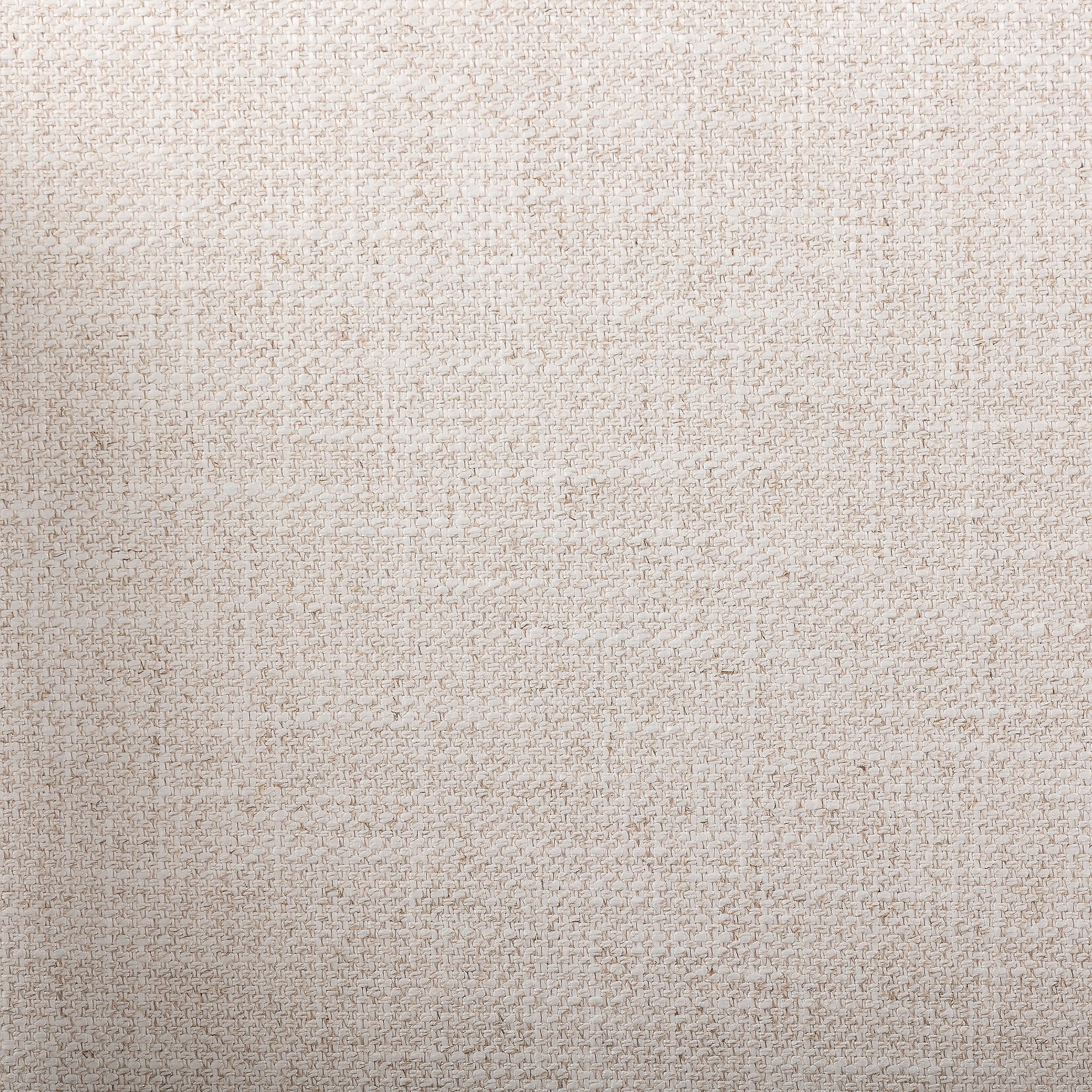 Close up of a wooden dining arm chair with woven backrest and white cushion on a white background.