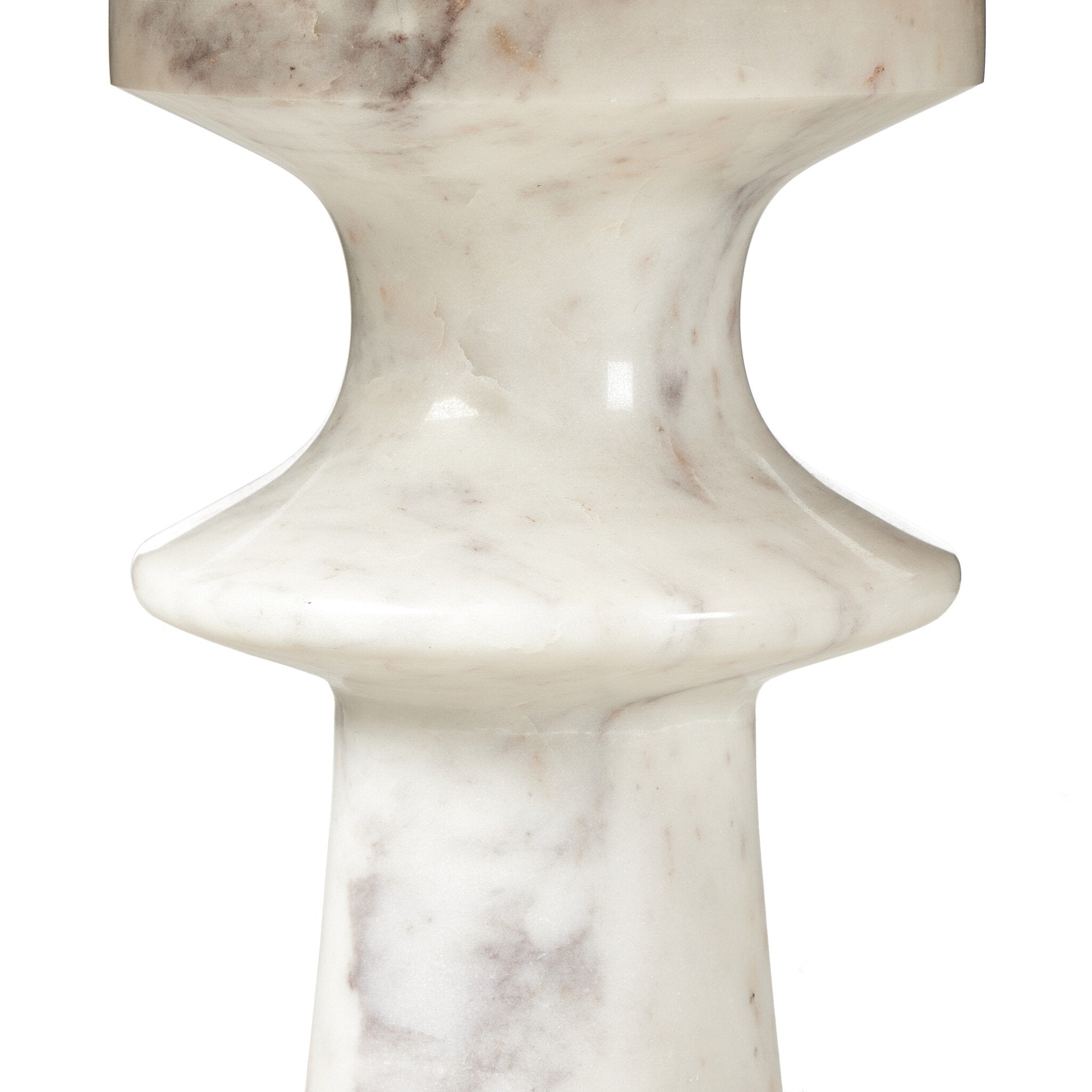 Close up of the white marble end table sculpted base on a white background.