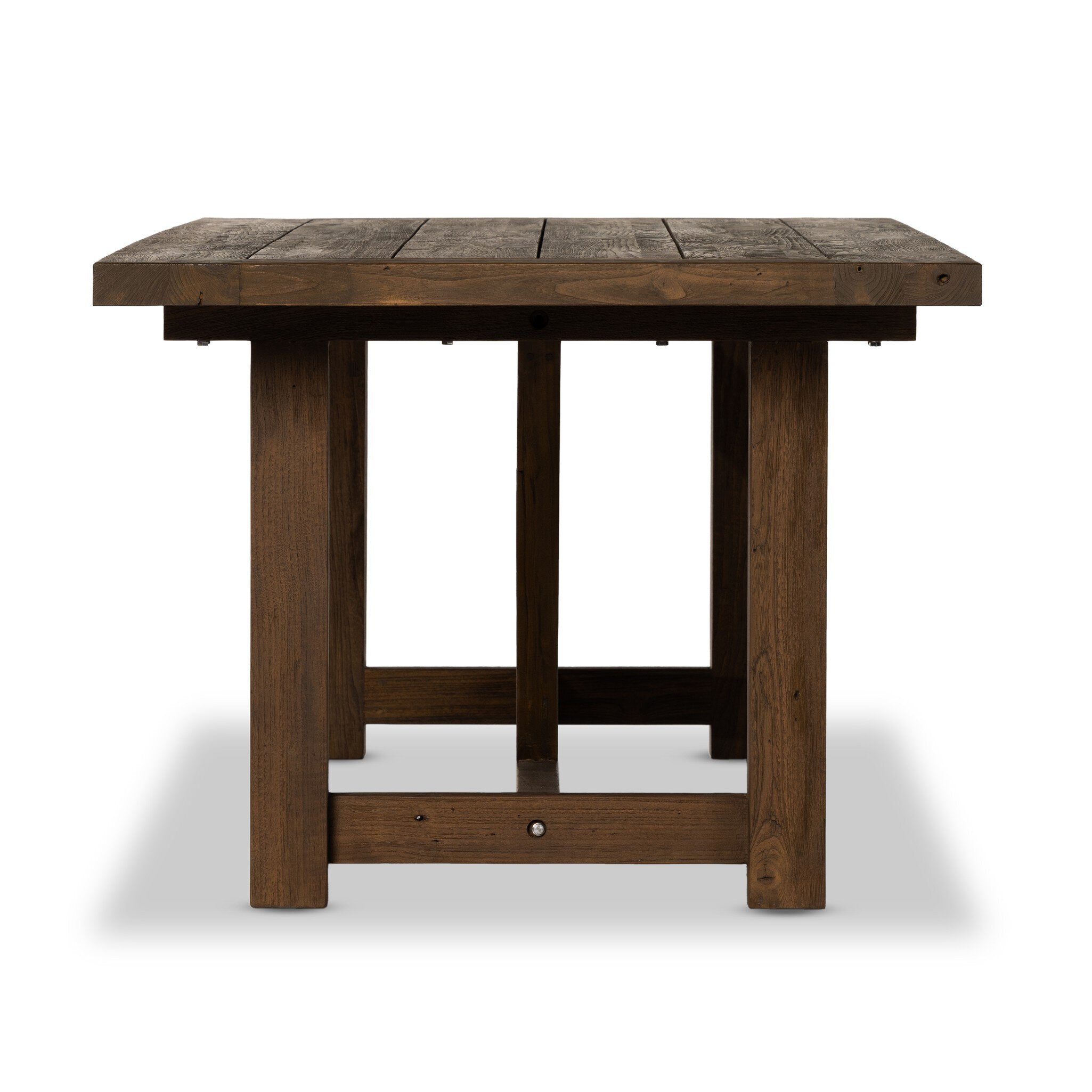 Trestle-style dining table made from reclaimed teak on a white background.