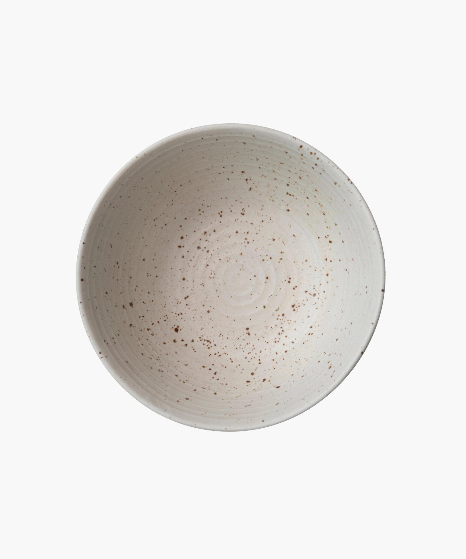 An overhead picture of a beige ceramic bowl with a speckled pattern and a smooth, rounded shape. The bowl's minimalistic design conveys a rustic, handcrafted aesthetic. | Wildwood Home Co.