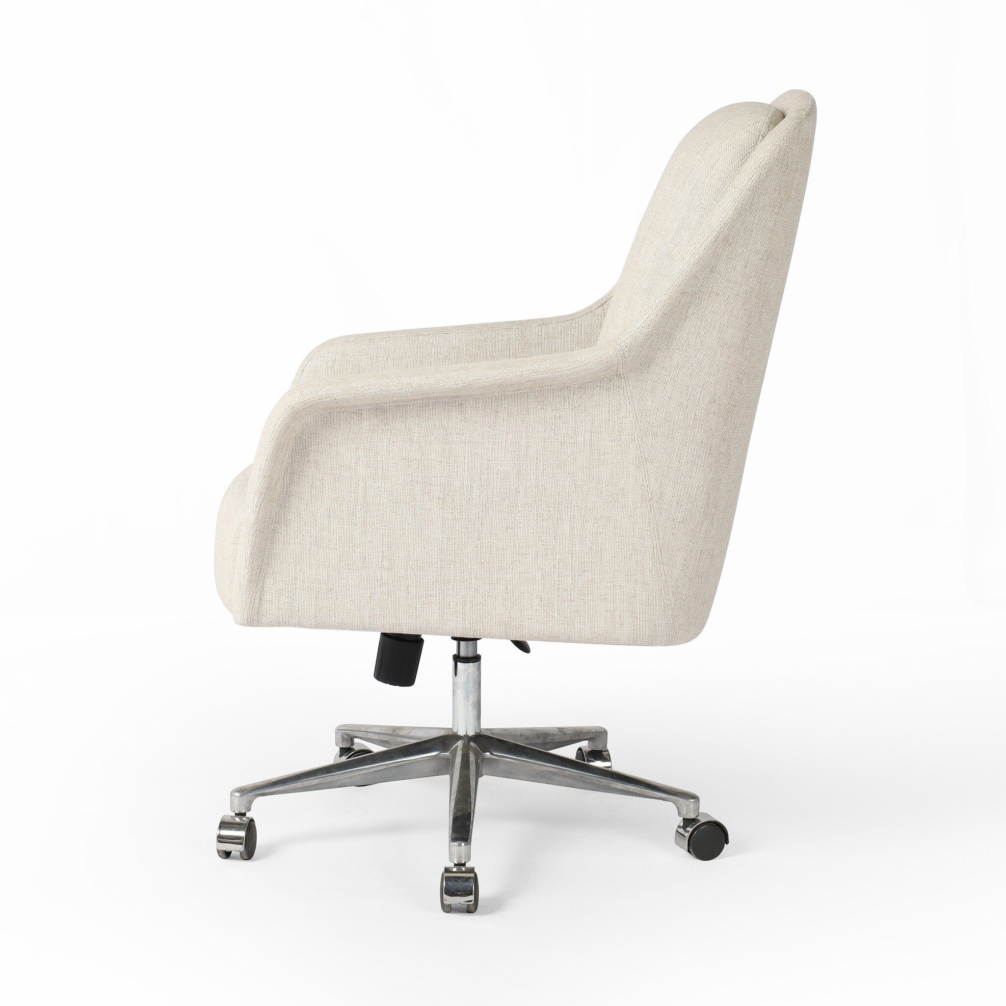 Side profile of an ivory upholstered desk chair with a chrome base on a white background.