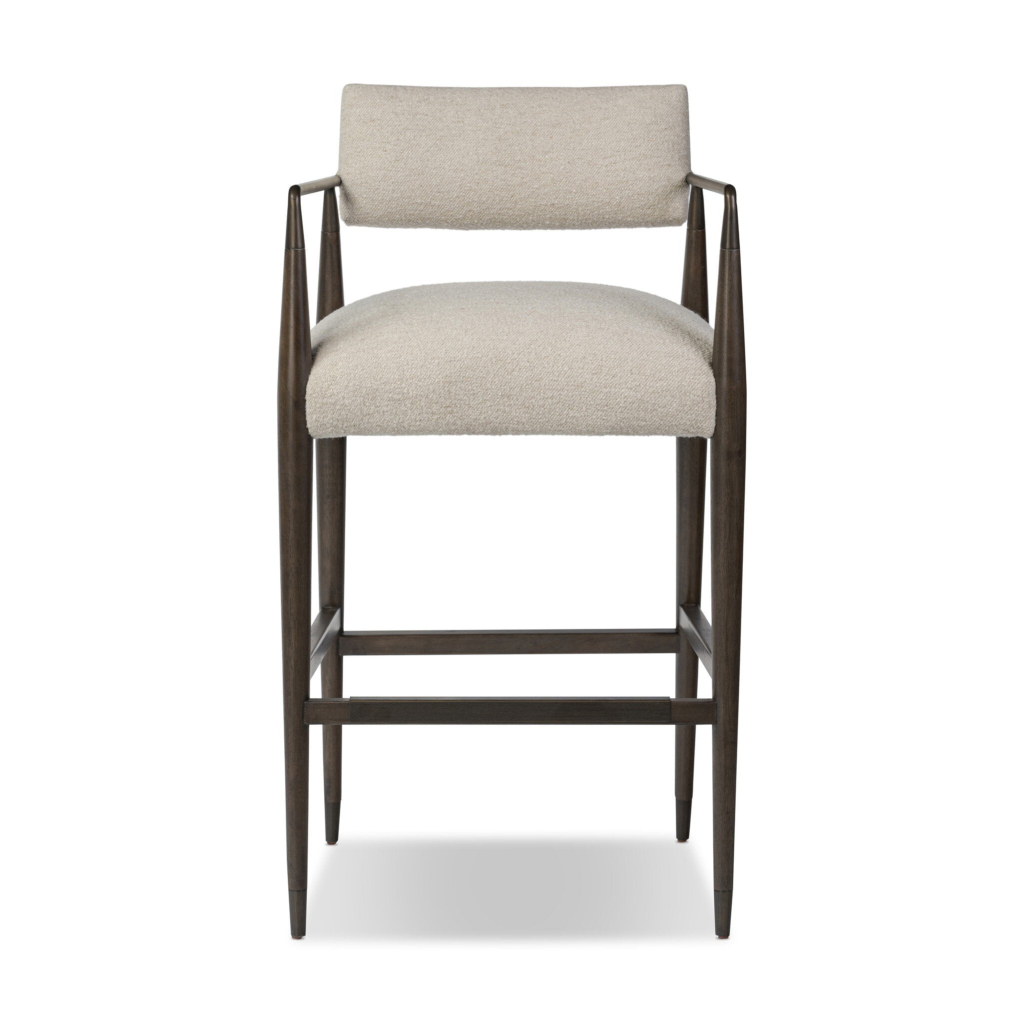 Bar stool with beige cushioned seat and backrest on a white background. | Wildwood Home Co.