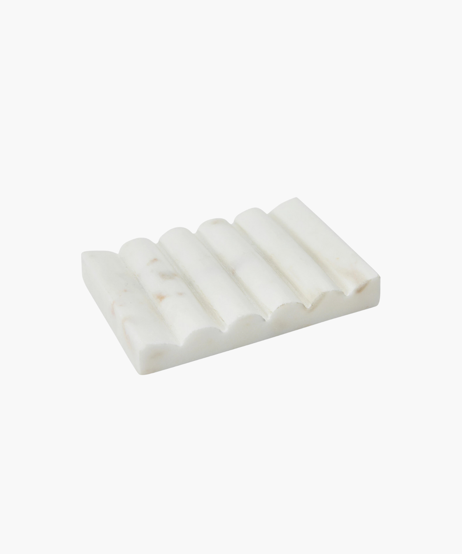 A rectangular white marble soap dish with a wavy, textured surface, conveying an elegant and natural aesthetic.