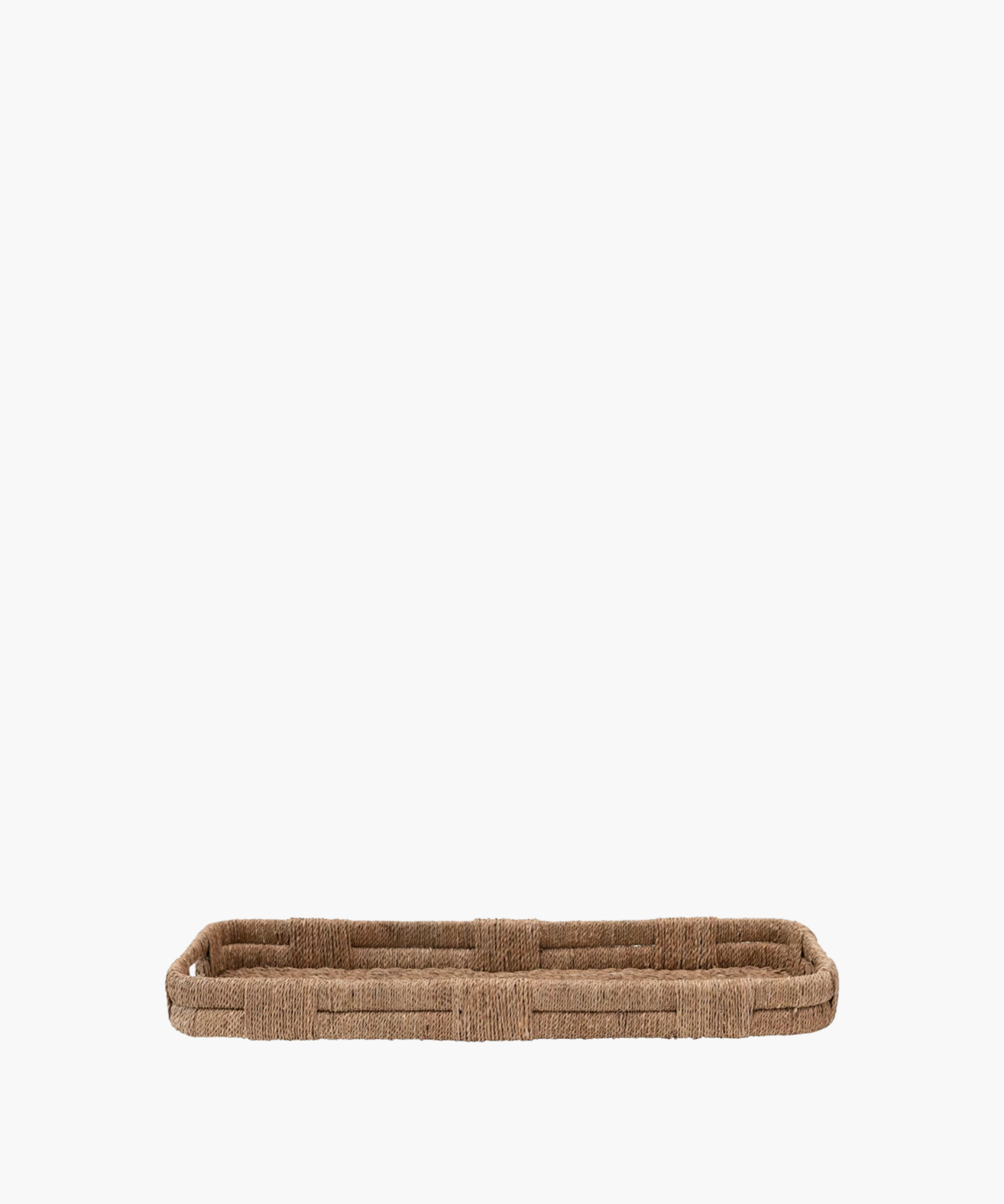A long, rectangular woven wicker tray with short sides, displaying a natural brown color. It conveys a rustic, minimalist aesthetic.